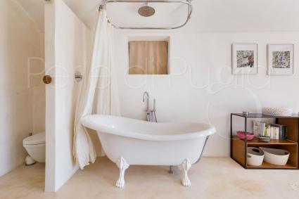 A unique bathtub, directly in the room