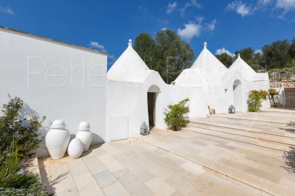 The complex of ancient rural dwellings formed by 3 trulli and a lamia