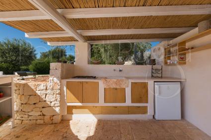 There is a very comfortable outdoor kitchen for preparing meals outdoors and enjoying nature