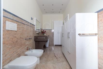 There are several bathrooms in the service of luxury villa for rent
