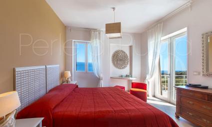 double bedroom on the first floor with balcony, sea view and private bathroom