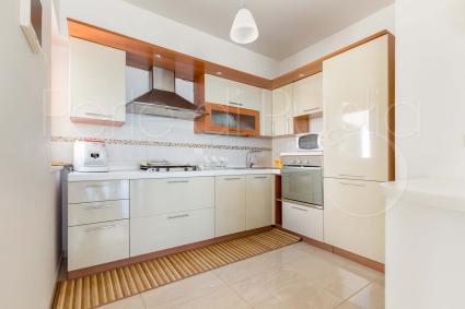 Kitchen with electric oven and dishwasher