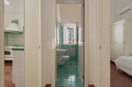 Bathroom with shower and without bidet